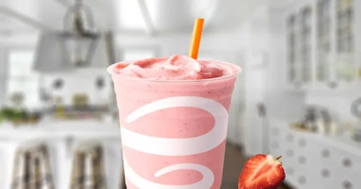 Jamba Juice Aloha Pineapple Smoothie 6 Jamba Juice Aloha Pineapple smoothie in a glass, on my kitchen counter, surrounded by fresh strawberries and pineapple slices.