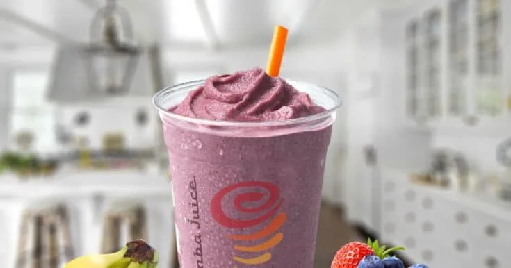 Jamba Juice Five Fruit Frenzy Smoothie 8 Jamba Juice Five Fruit Frenzy smoothie in a glass, on my kitchen counter, surrounded by bananas and fresh berries.