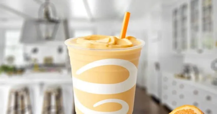 Jamba Juice Orange Dream Machine smoothie in a glass, on my kitchen counter.