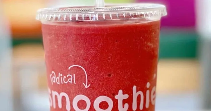 Jamba Juice Secret Menu Berry Lime Sublime smoothie in a glass, at the store.