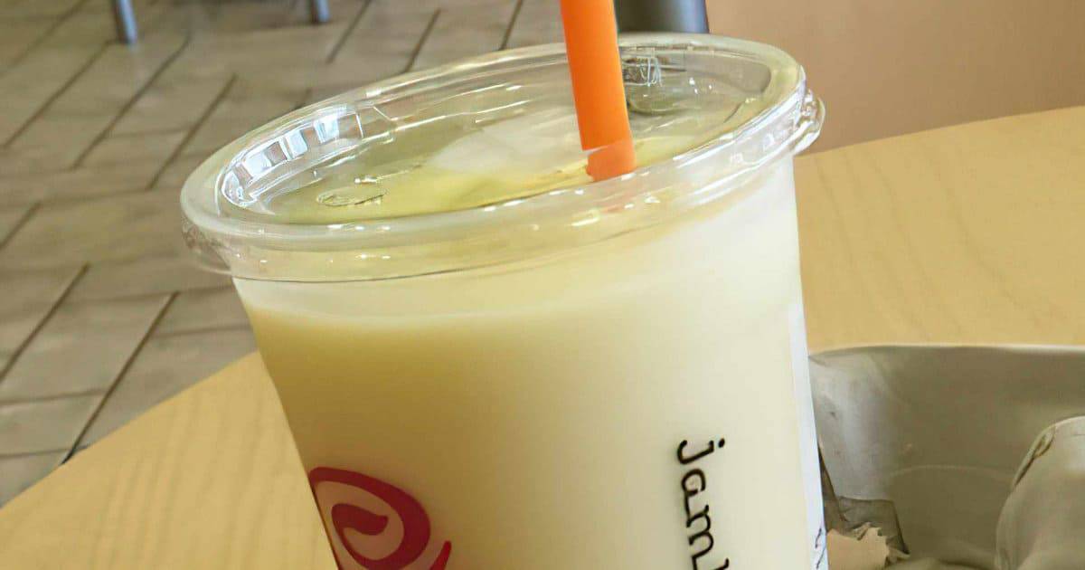 Jamba Juice Secret Menu Pineapple Dream Machine smoothie in a glass, at the store.