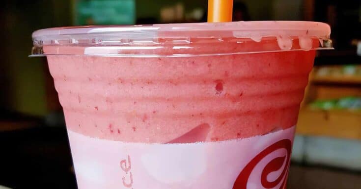 Jamba Juice Secret Menu Strawberry Cheesecake smoothie in a glass, on my kitchen counter.