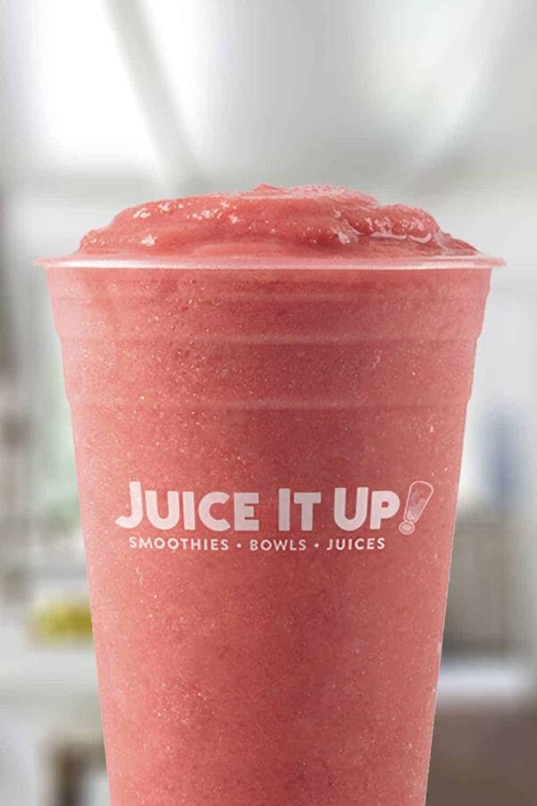 Juice It Up Lucky Lemon Punch smoothie in a glass, on my kitchen counter.