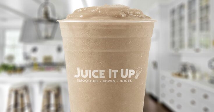 Juice It Up PB Cold Brew Mocha smoothie in a glass, on my kitchen counter.