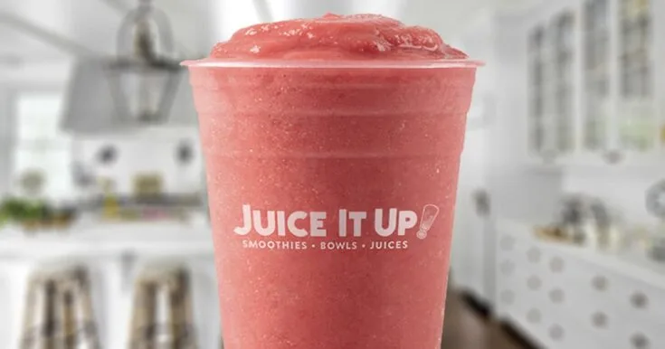 Juice It Up Raspberry Craze Smoothie 8 Juice It Up Raspberry Craze smoothie in a glass, on my kitchen counter.