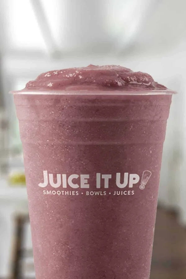 Juice It Up Ultimate Açaí smoothie in a glass, on my kitchen counter.