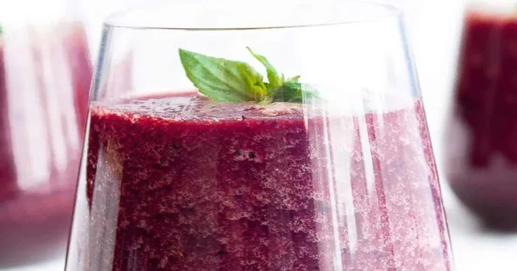 Vitamix Beet Pomegranate Citrus Smoothie 9 Vitamix Beet Pomegranate Citrus smoothie in a glass, on my kitchen counter, surrounded by fresh fruit and vegetables.