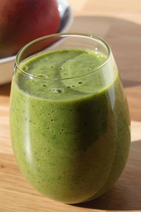 Ninja Blender Green Matcha Shot smoothie in a glass, on my kitchen counter.