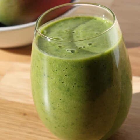 Ninja Blender Green Matcha Shot smoothie in a glass, on my kitchen counter.