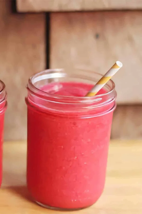 Ninja Blender Raspberry Mint Lemonade smoothie in a glass, on my kitchen counter.