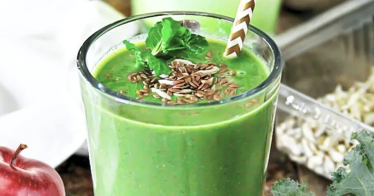 NutriBullet Runner's Favorite Smoothie 11 NutriBullet Runner's Favorite smoothie in a glass, on my kitchen counter, surrounded by fresh fruit and vegetables.