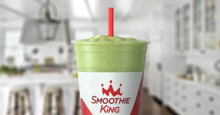 Smoothie King Veggie Apple Kiwi Kale 6 Smoothie King Veggie Apple Kiwi Kale smoothie in a glass, on my kitchen counter, surrounded by fresh kiwis and kale.