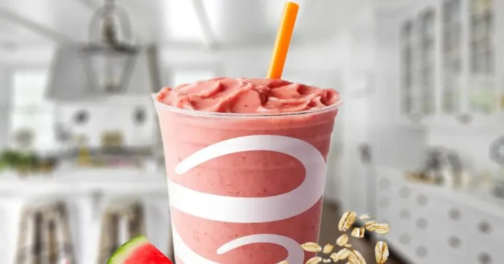 Jamba Juice Watermelon Breeze Dairy Free Smoothie 7 Jamba Juice Watermelon Breeze Dairy Free smoothie in a glass, on my kitchen counter, surrounded by fresh watermelon and oats.