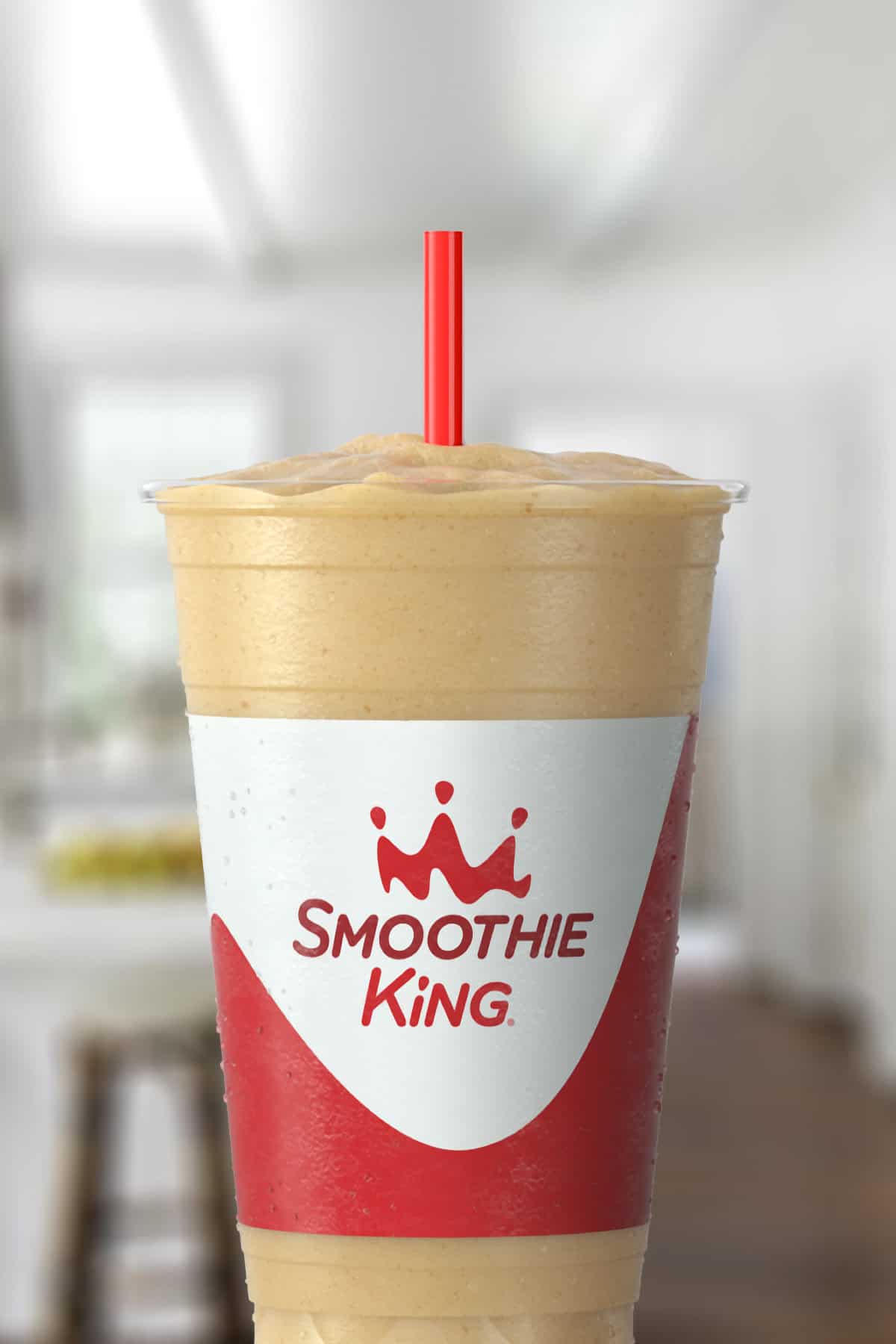 Smoothie King The Shredder Vanilla smoothie in a glass, on my kitchen counter.